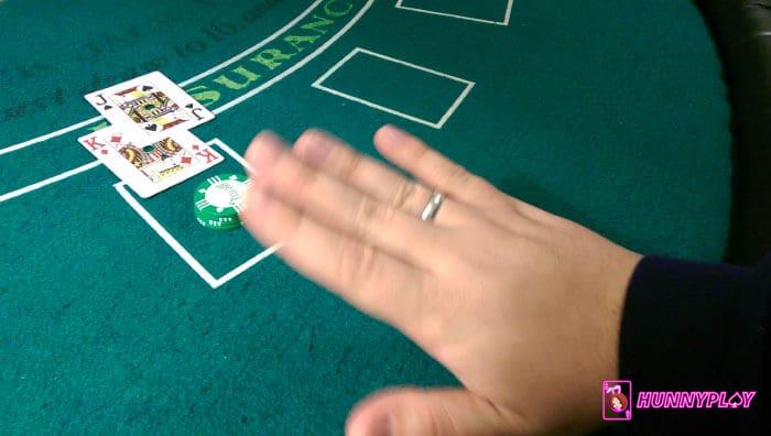 Standing hand signal in Blackjack table